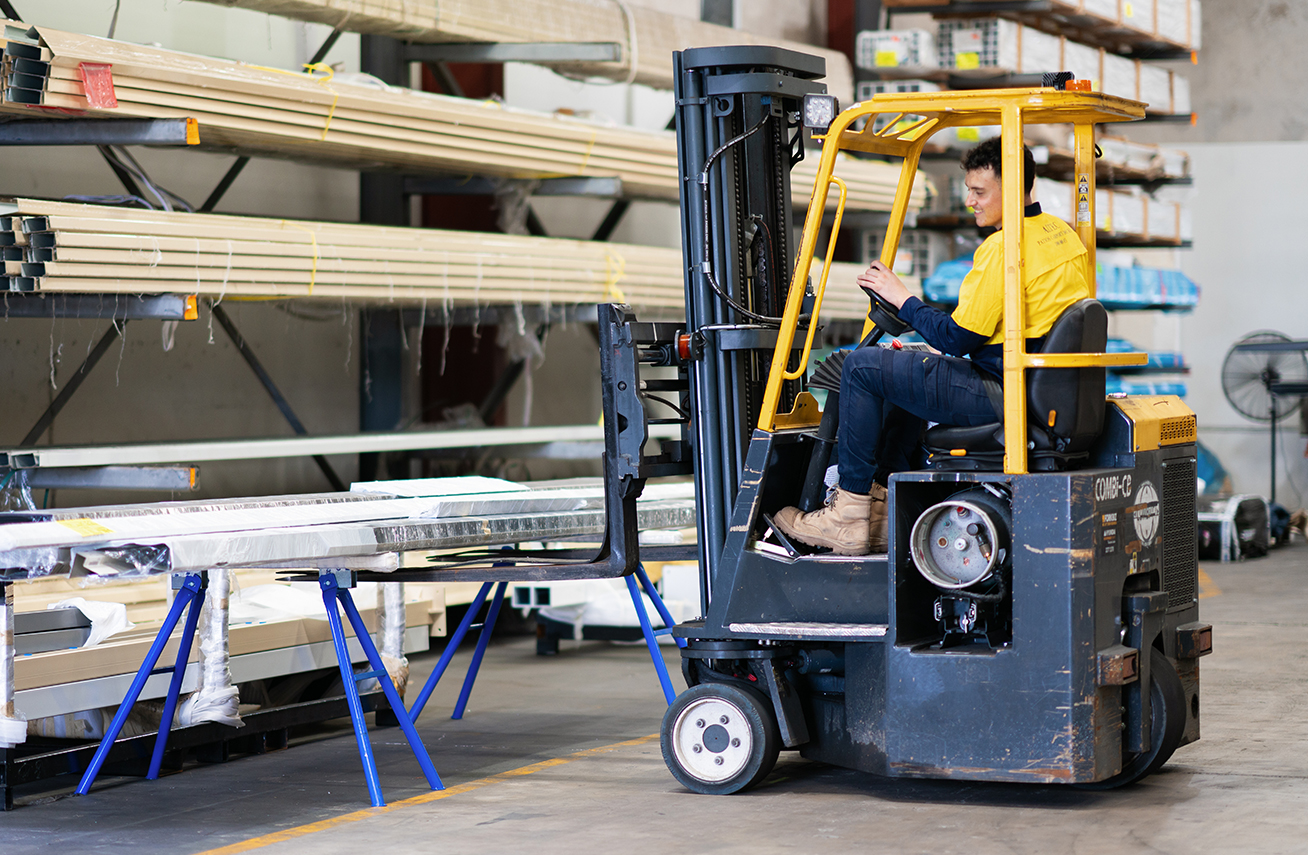 Warehouse staff on forklift